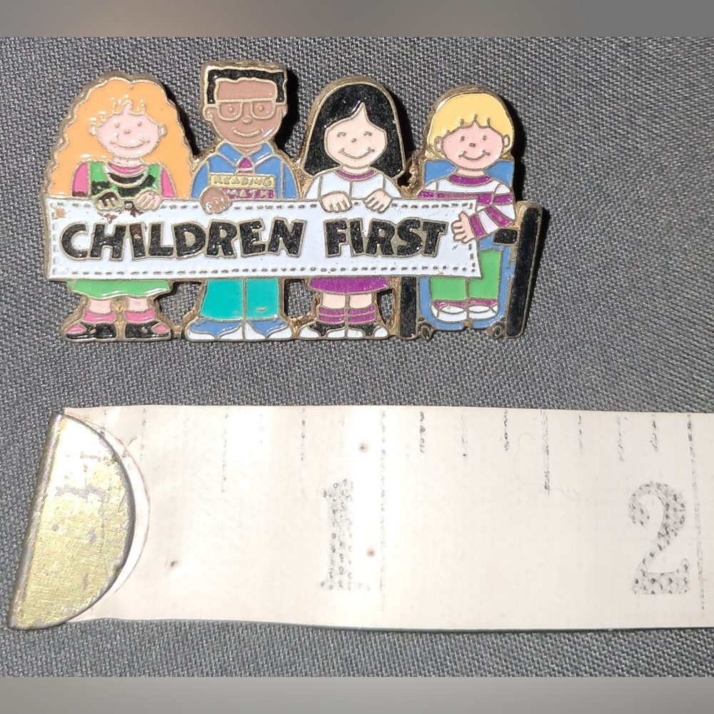 CHILDREN FIRST LAPEL PIN